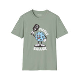Pickle Baller T Shirt featuring a playful pickleball character with a cheeky slogan.