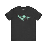 Locally Hated soft tee in gray with bold cursive font, perfect for standing out in the Pacific Northwest.