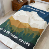 Adventure Is Out There and So Are Serial Killers Lightweight Cozy Blanket showcasing forest and mountain design.