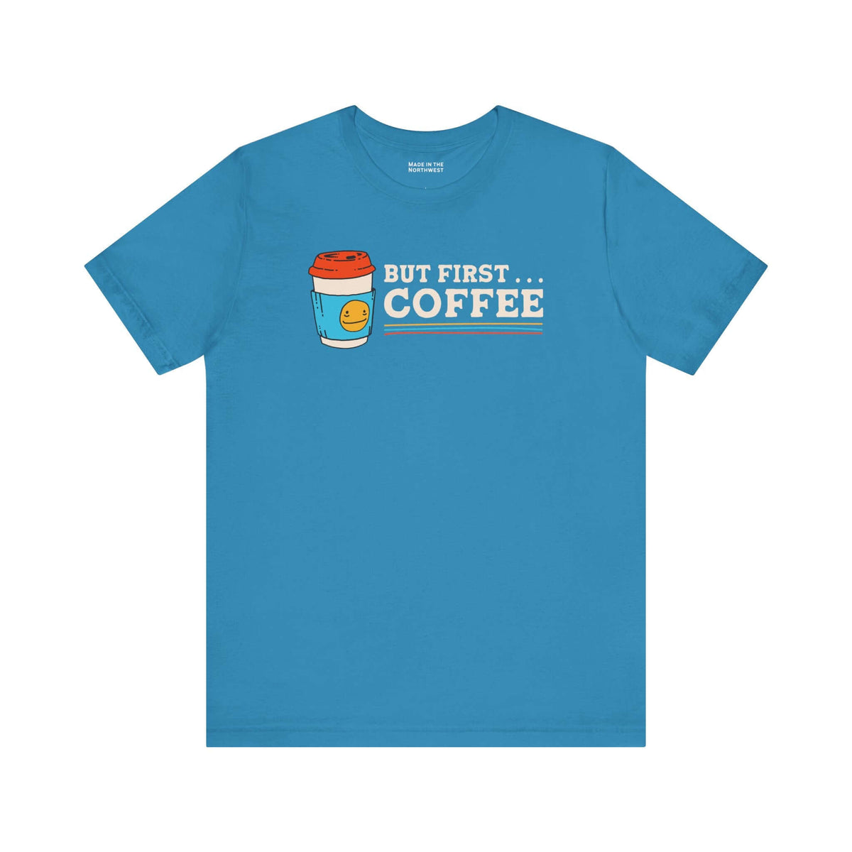 But First Coffee T Shirt featuring a vibrant blue color with a coffee cup graphic and playful text.