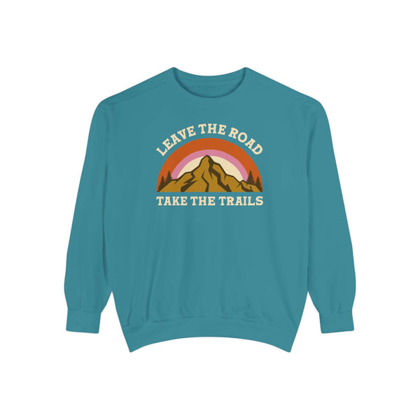 Leave the Road Take the Trails Sweatshirt featuring a mountain design and vibrant colors for outdoor enthusiasts.