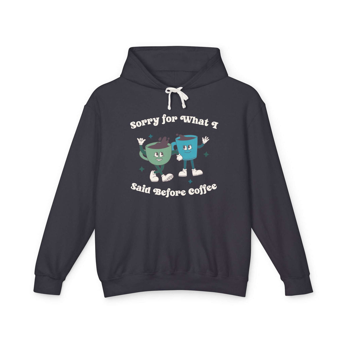 Black hoodie with playful design stating 'Sorry for What I Said Before Coffee' featuring cartoon coffee cups.