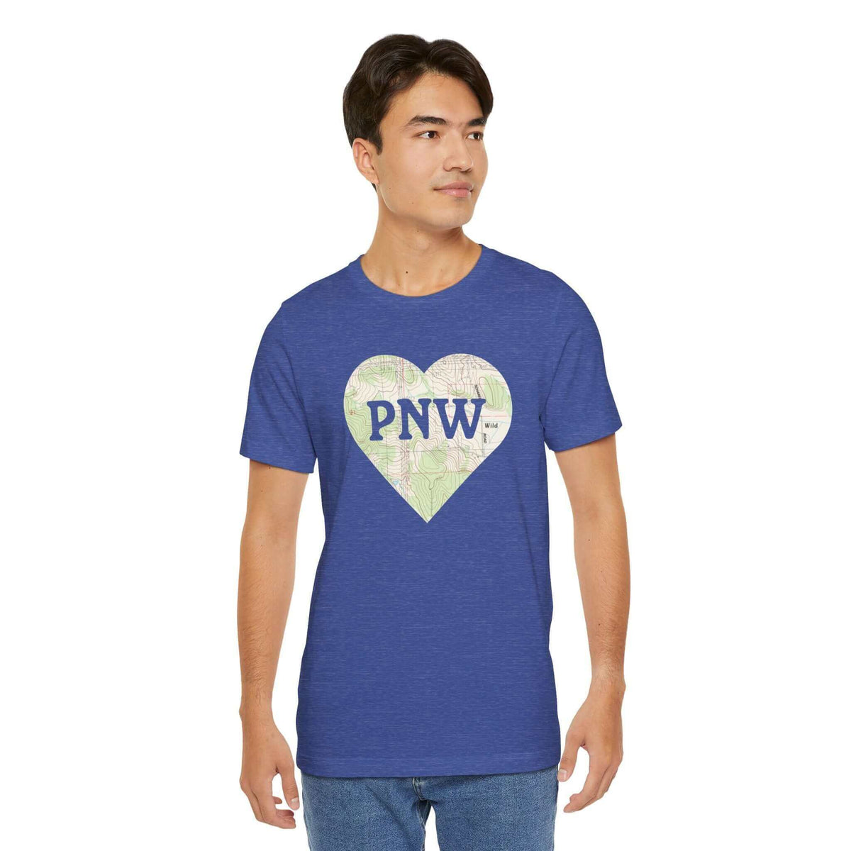 Man wearing blue PNW Explorer's Heart tee with topo map heart design