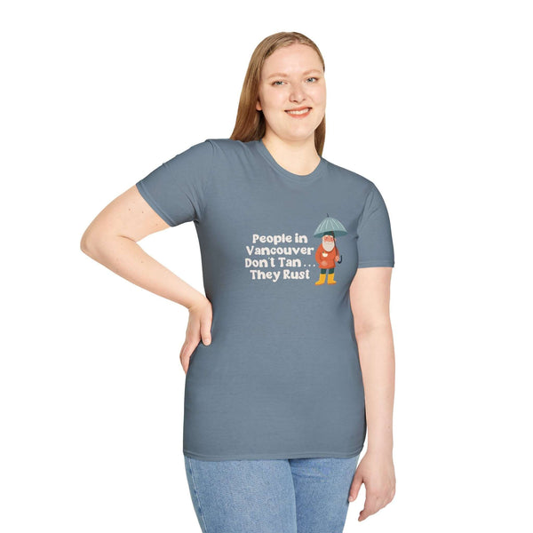 Model wearing 'People in Vancouver Don't Tan, They Rust' t-shirt with gnome and umbrella design.
