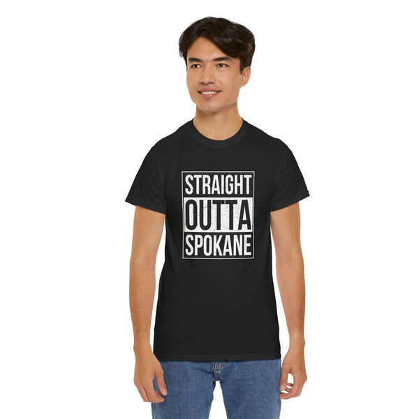 Person wearing "Straight Outta Spokane" black athletic tee, showcasing city pride and streetwear style.