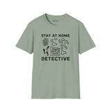 Stay at Home Detective T Shirt featuring crime scene graphics and playful text design.