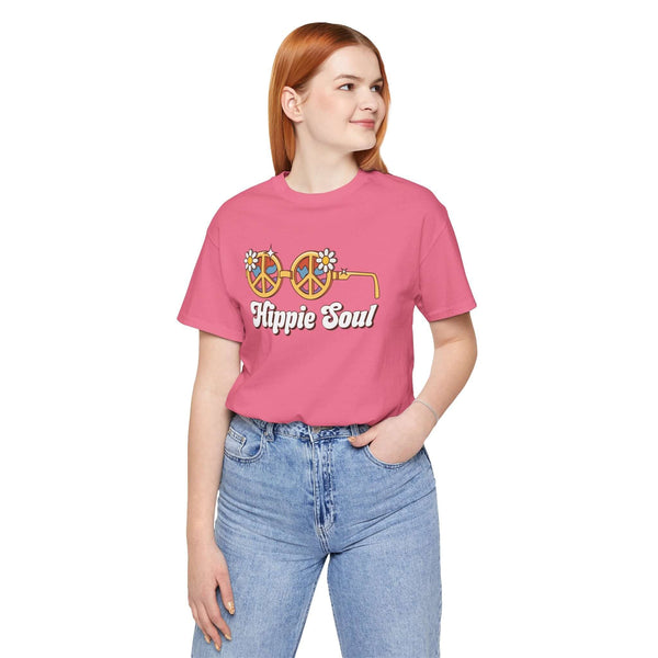 Model wearing Hippie Soul retro peace tee with colorful flower glasses in a playful pink shade.