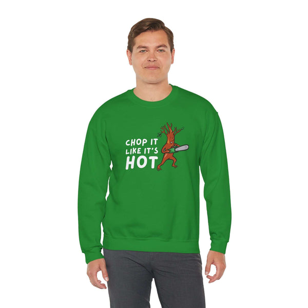 Green unisex crewneck sweatshirt featuring 'Chop It Like It's Hot' with animated tree and chainsaw design.