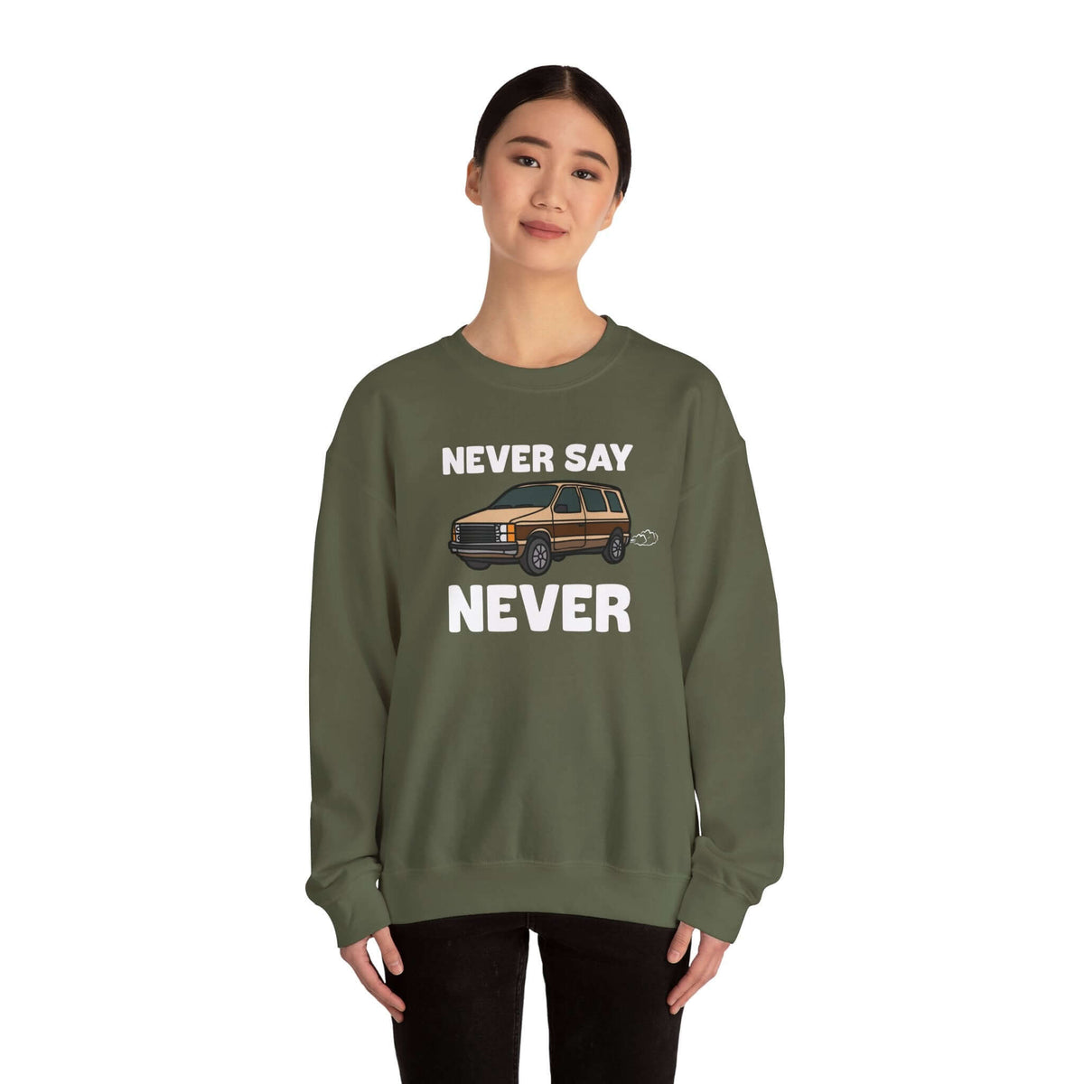 Cozy vintage 80s sweatshirt featuring Dodge Caravan graphic and 'Never Say Never' text.
