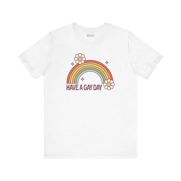 Have a Gay Day T Shirt featuring a rainbow and flowers on a white background, perfect for LGBTQ+ positivity.