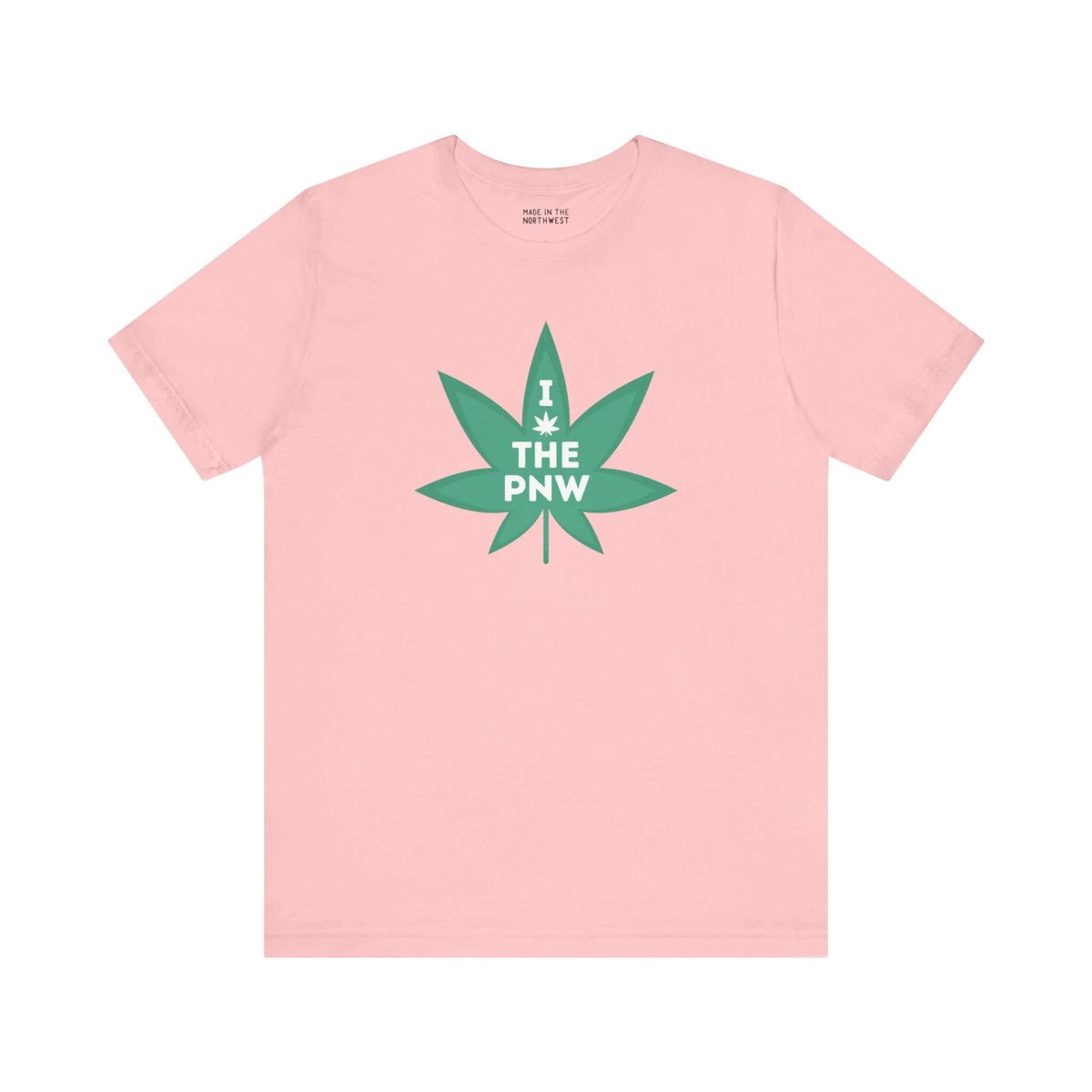 Pink tee with green marijuana leaf reading "I (Weed) the PNW," celebrating Pacific Northwest's relaxed, nature-loving vibe.