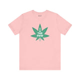 Pink tee with green marijuana leaf reading 