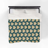 Oregon State of Mind Heart Lightweight Cozy Blanket featuring a heart pattern design in shades of gold on a dark background.