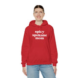 Red hoodie with 'spicy spokane mom' text, perfect for active Spokane moms who love style and comfort.