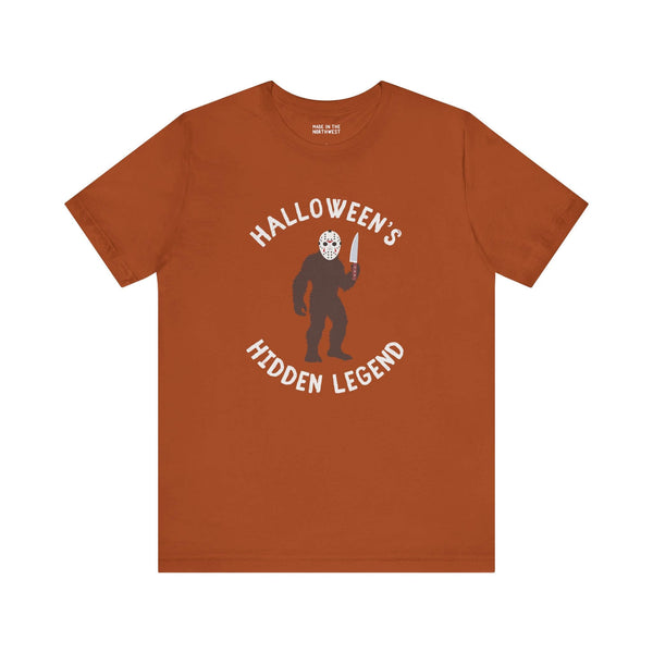 Bigfoot Halloween tee featuring Jason mask and knife, perfect for spooky season fans.