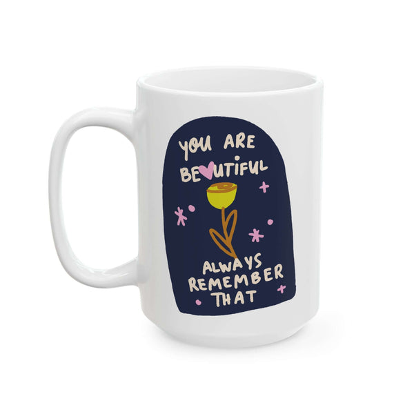 You Are Beautiful Always Remember That Mug with colorful print on glossy ceramic surface.