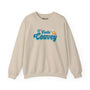 Feelin' Couvey retro sweatshirt featuring colorful flower graphic, celebrating Vancouver's spirit in a stylish beige design.