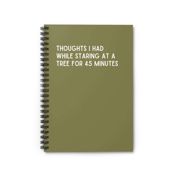 Thoughts I Had While Staring at a Tree spiral notebook cover in olive green with white text.