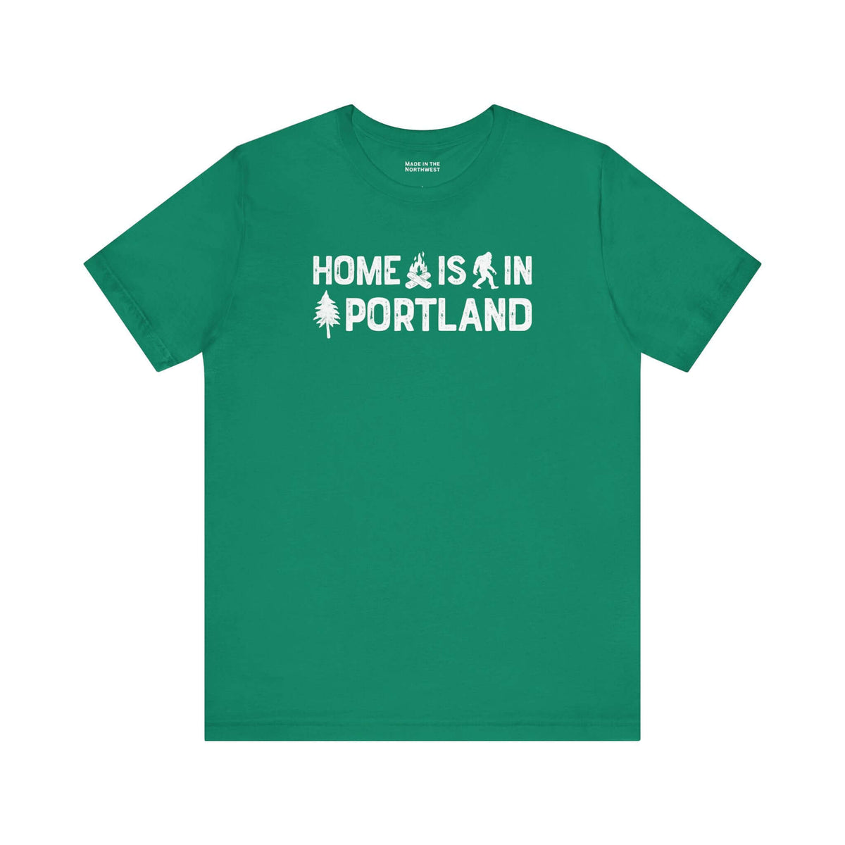 Home Is in Portland Tee – Rose City Pride shirt featuring campfire, tree, and Bigfoot illustrations.