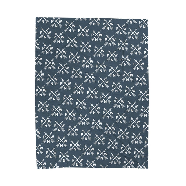 PNW Arrow Crossroads Lightweight Cozy Blanket with arrow design and PNW initials on fabric.