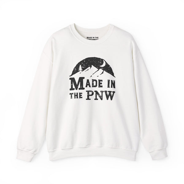Made in the PNW sweatshirt featuring a distressed mountain design on a white crewneck.