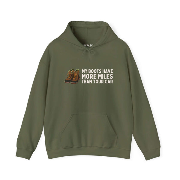 Unisex hoodie in olive green with 'My Boots Have More Miles Than Your Car' design, perfect for outdoor enthusiasts.