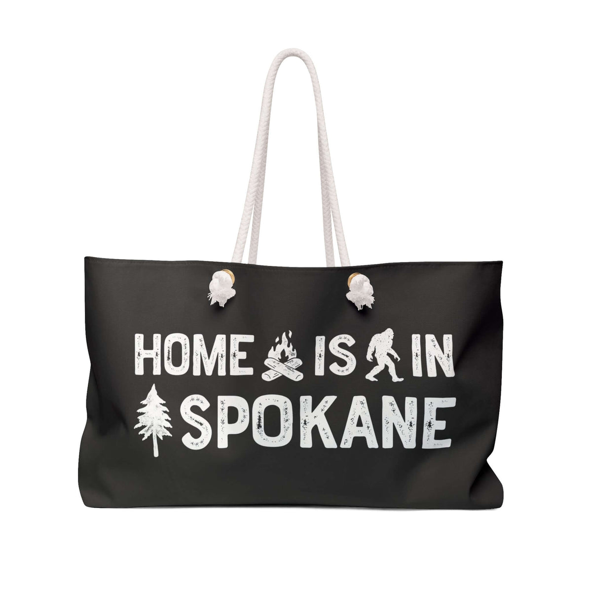 Home is in Spokane Weekender Bag showing campfire, sasquatch, and tree graphics on a stylish tote.