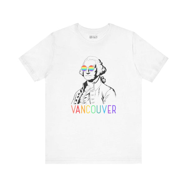 White tee with George Washington line art wearing rainbow glasses and "Vancouver" in rainbow letters, celebrating Pride and inclusivity.