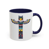 Totem Pole Mug featuring a vibrant totem design on a glossy white exterior with a colored handle.