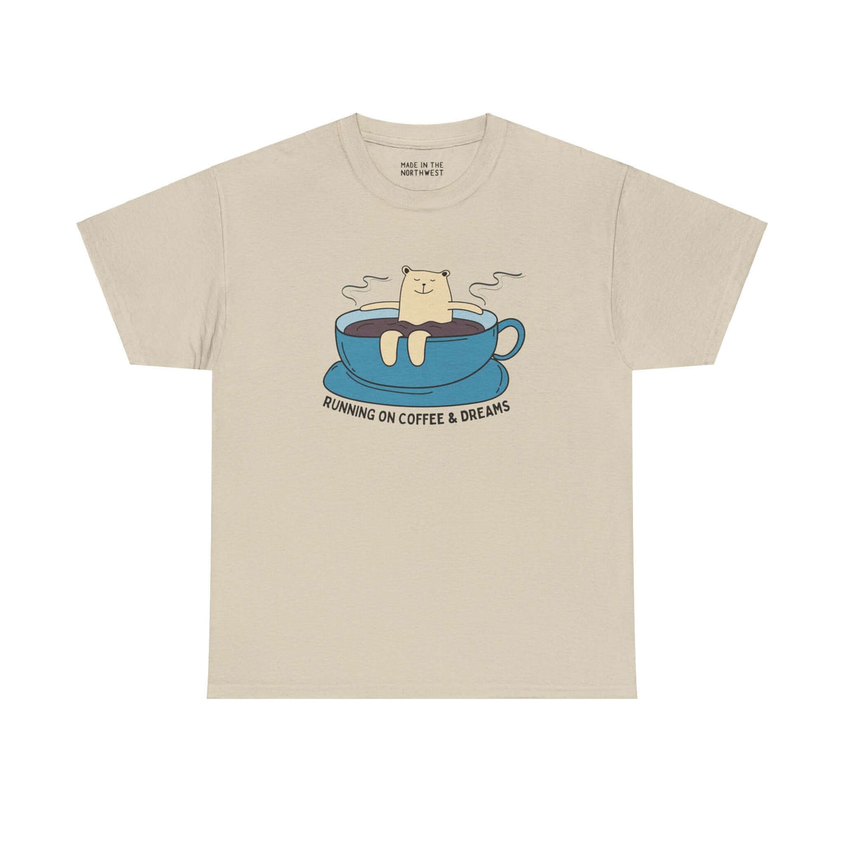 "Running on Coffee and Dreams tee with a bear lounging in a coffee cup, perfect for caffeine lovers and PNW adventurers"