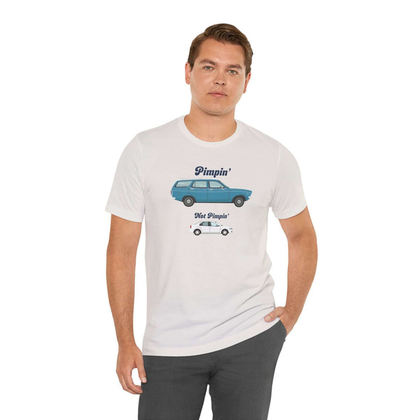 Man wearing a 'Pimpin' Not Pimpin'' tee showcasing a Subaru GL 1600 graphic, emphasizing wagon pride.