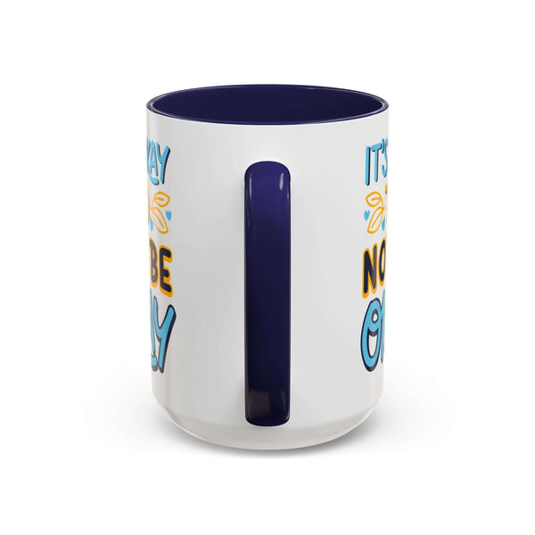 It's Okay To Not Be Okay Mug with colorful lettering and navy handle, perfect for uplifting mornings.
