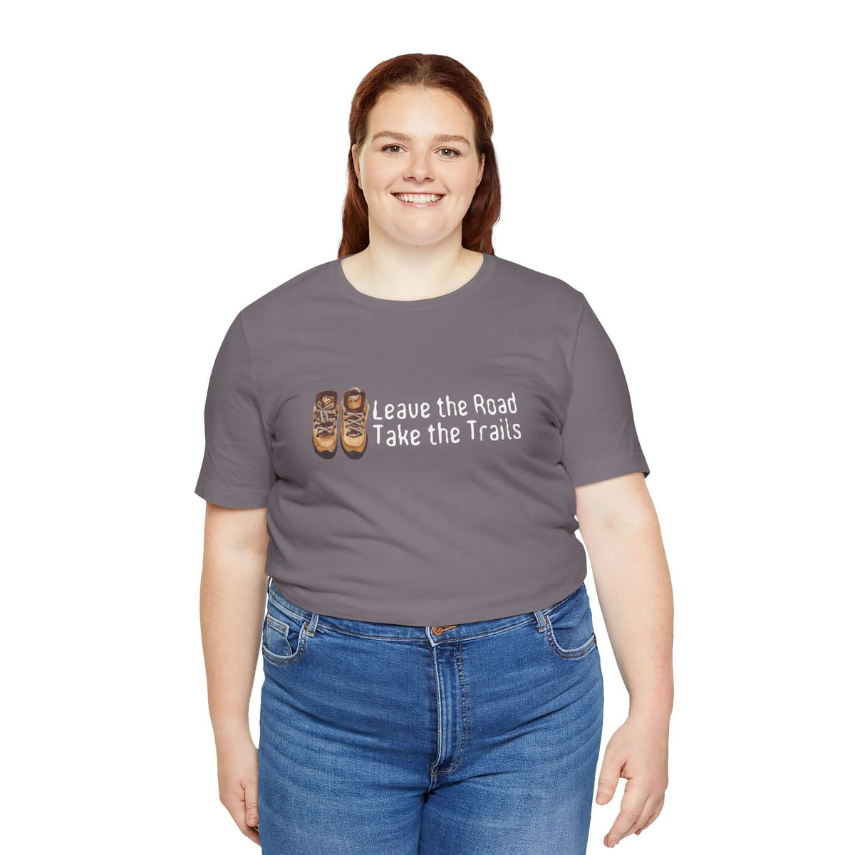 Unisex gray tee featuring 'Leave the Road, Take the Trails' design, perfect for outdoor enthusiasts.