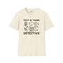 Stay at Home Detective T Shirt featuring a playful crime scene graphic and text design.