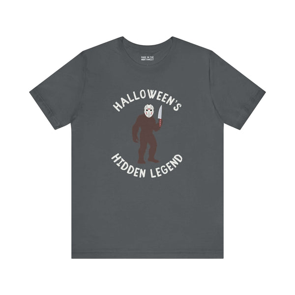Halloween's Hidden Legend Bigfoot tee featuring a Sasquatch dressed as Jason with a knife, perfect for spooky season.
