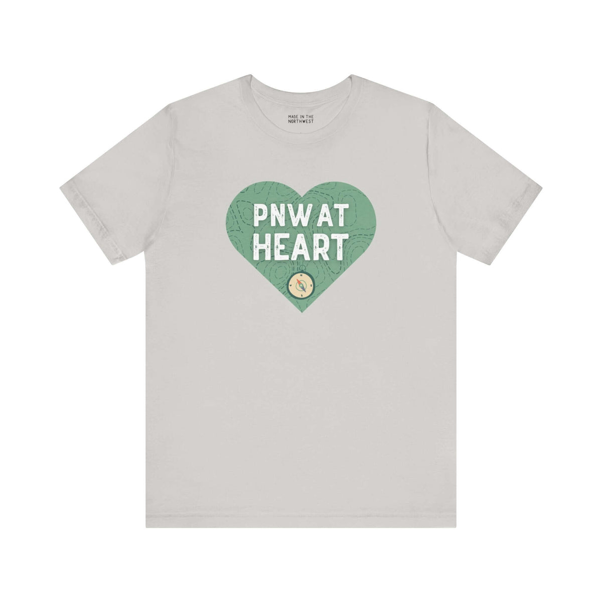 "PNW at Heart Compass Soft Tee featuring a green heart and compass design, perfect for Pacific Northwest adventure enthusiasts."