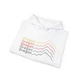 Oregon Minimalist Mountain Hoodie with stacked mountain graphics in mid-century colors on a white background.