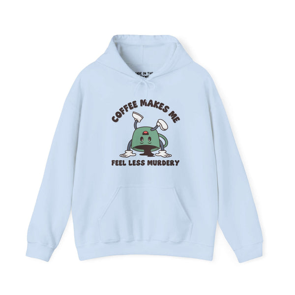 Light blue hoodie with "Coffee Makes Me Feel Less Murdery" and cartoon coffee pot design. Cozy, humorous graphic sweatshirt.