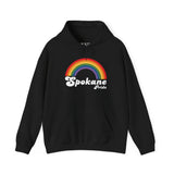 Cozy black hoodie featuring Spokane Pride text and a vibrant rainbow arch design, celebrating inclusivity and love.