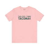 Pink Two Five Three Tacoma tee featuring area code text with axe and tree design, celebrating Tacoma pride and hometown spirit.