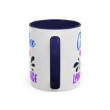 Coffee Is My Love Language Mug with colorful graphics and a navy blue interior and handle.