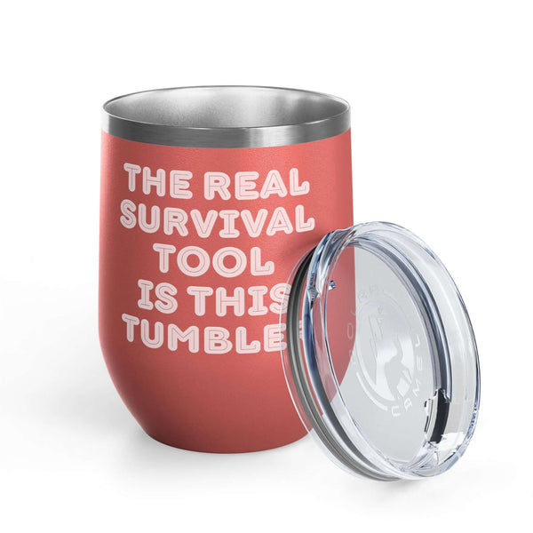 The Real Survival Tool Camping Wine Tumbler 12 oz with a stylish pink exterior and clear lid.