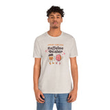 Man wearing 'Support Your Local Caffeine Dealer' coffee-themed soft tee, celebrating local coffee culture.