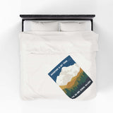 Adventure Is Out There and So Are Serial Killers Lightweight Cozy Blanket on a bed with nature design.