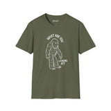 What Are You Looking At T Shirt featuring a sasquatch graphic and funny text on an olive-green background.