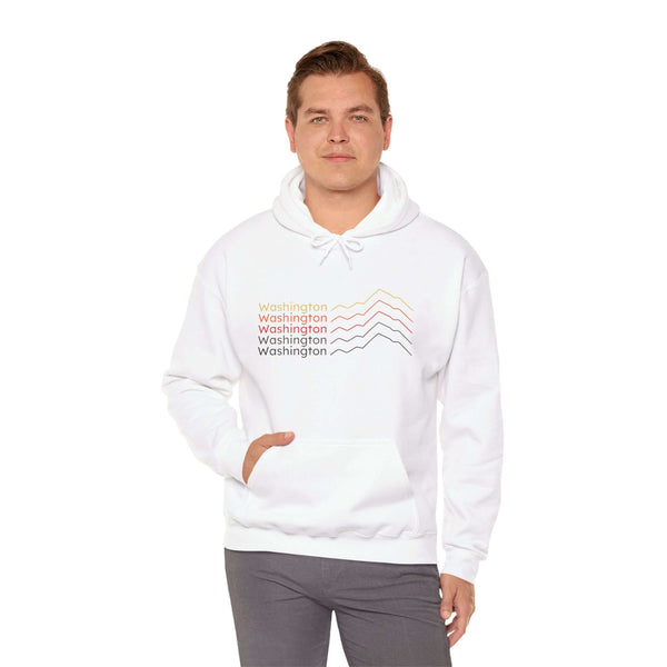 Man wearing Washington Minimalist Mountain Hoodie with stacked mountain design in mid-century colors.