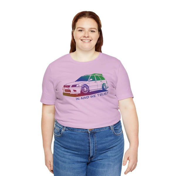 Woman wearing lavender In AWD We Trust tee featuring a slammed Subaru WRX wagon graphic.