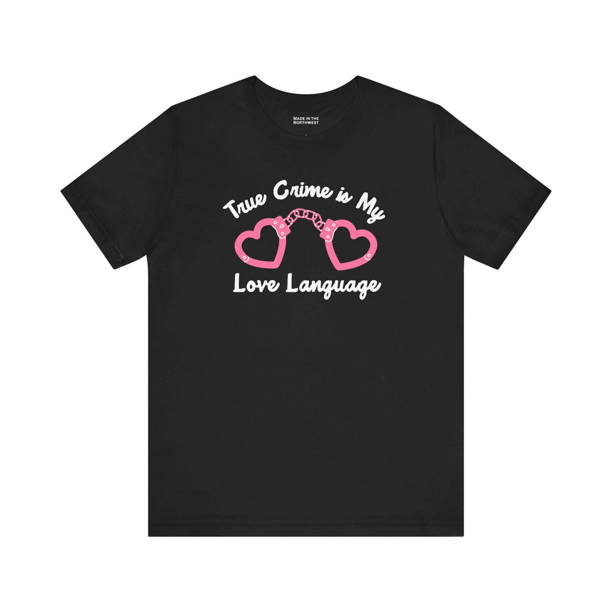 True Crime is My Love Language T Shirt featuring pink heart-shaped handcuffs on a black background.