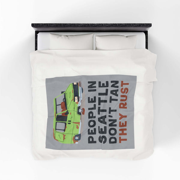 People in Seattle Don't Tan They Rust Lightweight Cozy Blanket featuring a funny rusty car design.