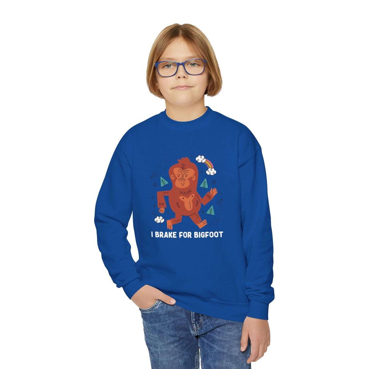 Child wearing blue "I Brake for Bigfoot" sweatshirt with Bigfoot graphic, perfect for adventure-loving kids.